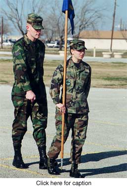 Air Force Senior Airman Tav Leggett practicing drills.