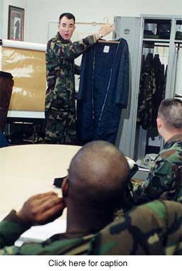 Photo of student demonstrating how to inspect.
